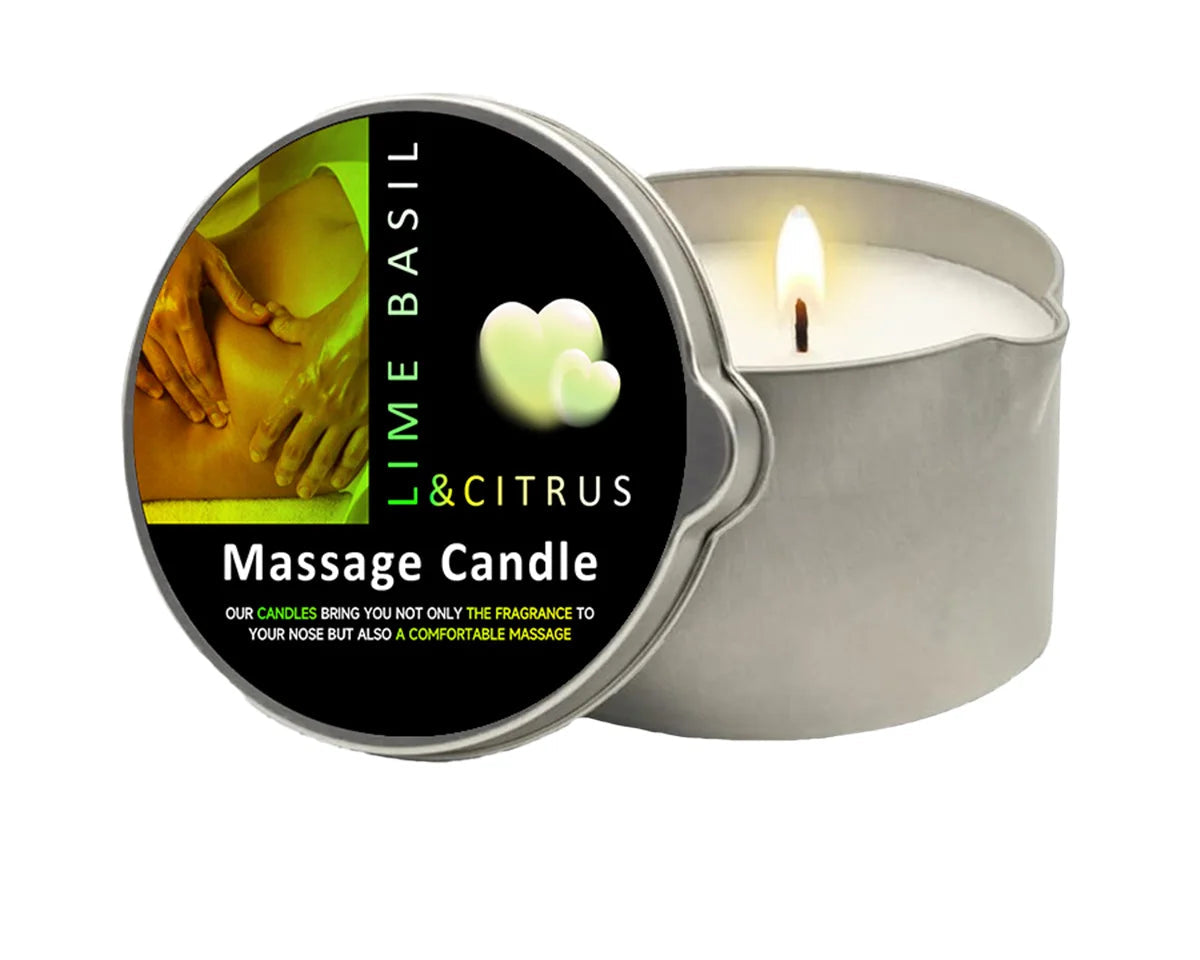 Massage candle with a lit wick and visible label on a white background