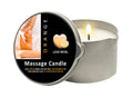 Massage candle with packaging labeled 'Orange Love Revel' on a white background