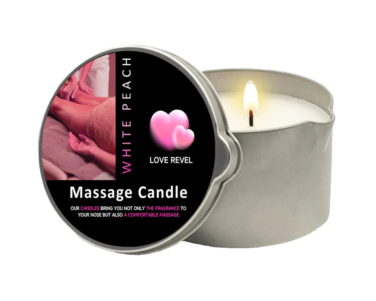 Massage candle with lit candle inside a metallic tin on a white background