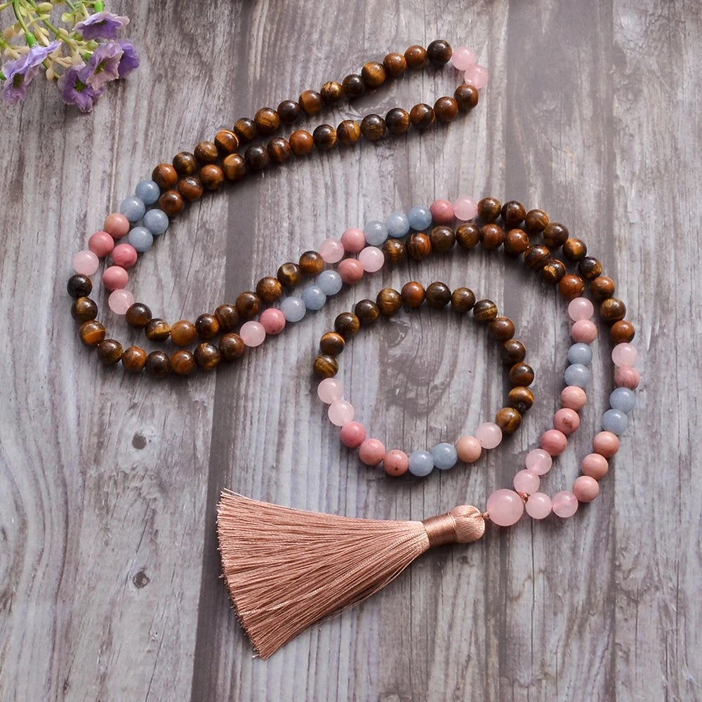 Beaded necklace with a tassel on a wooden surface