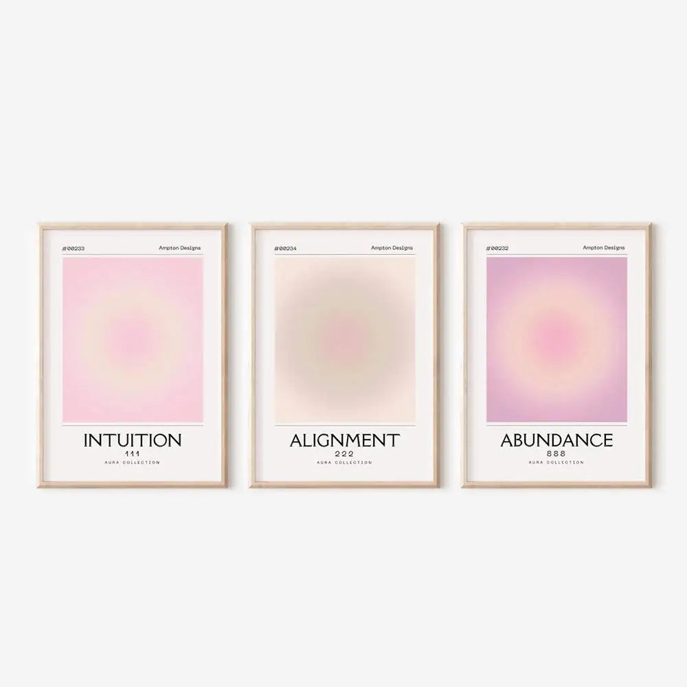 Three framed prints titled 'Intuition', 'Alignment', and 'Abundance' on a white background.