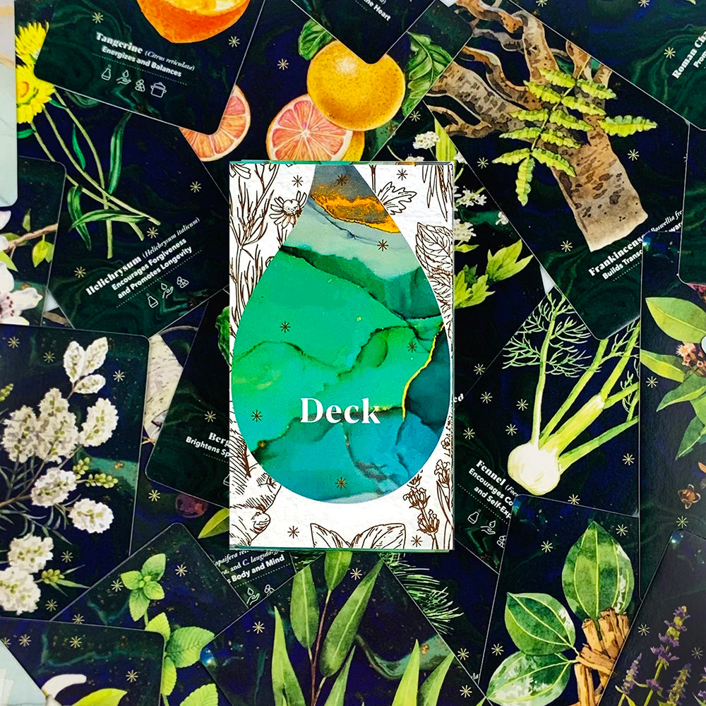 Card deck packaging with botanical designs on a dark background