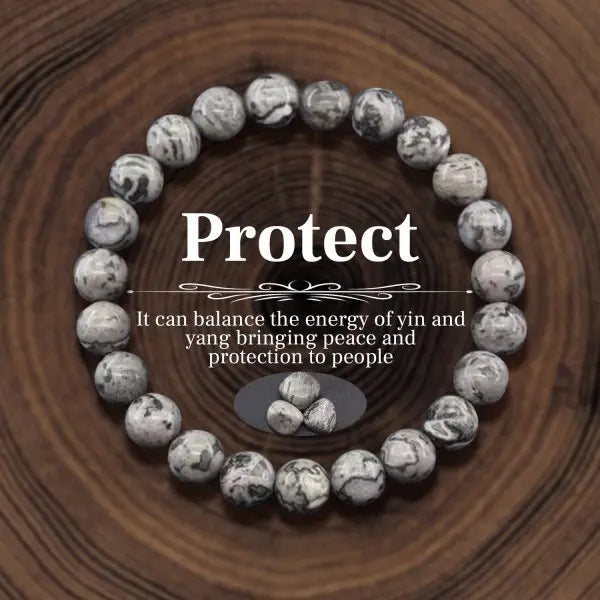 Beaded bracelet with text on a wooden background