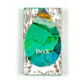 Card deck packaging with green abstract design and 'Deck' text on a white background