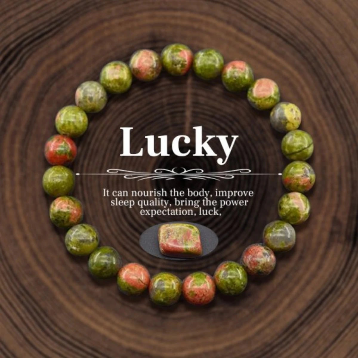 Green and red beaded bracelet on a wooden surface with text about its benefits.
