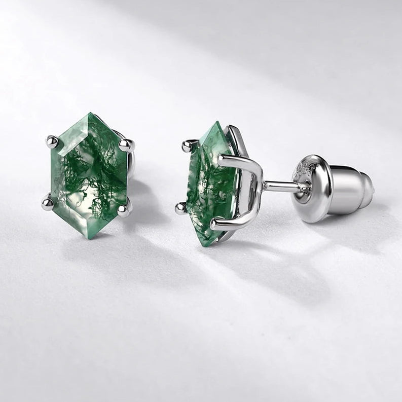 Green gemstone earrings on a white background with WES logo.
