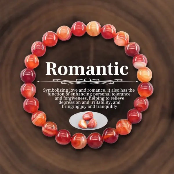 Round arrangement of red and orange beads with text on a brown background
