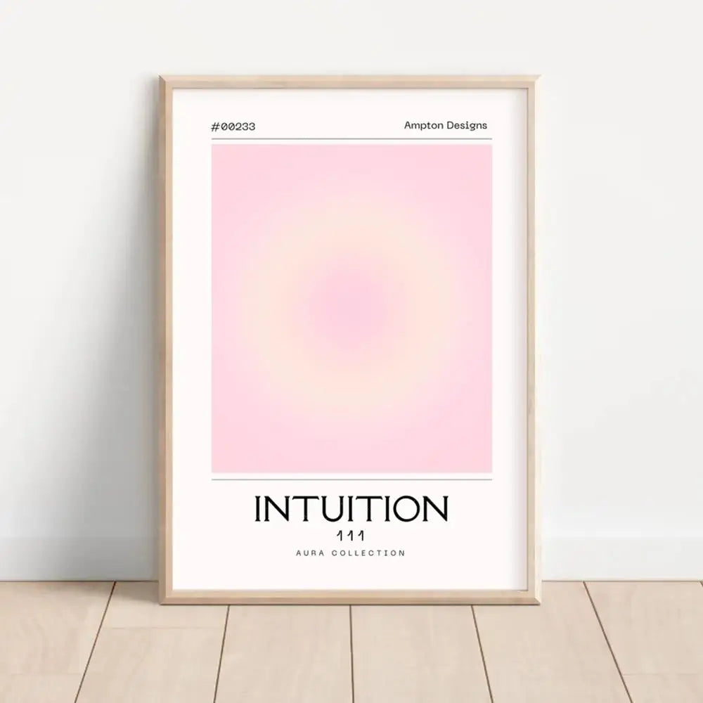 Framed artwork with a pink and yellow gradient and text on a white wall.