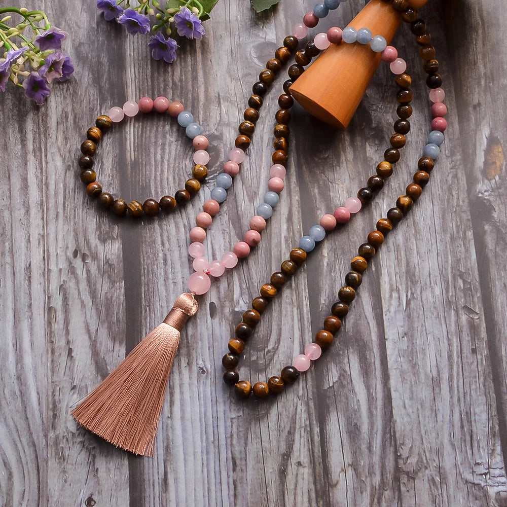 Beaded necklace with a tassel on a wooden surface