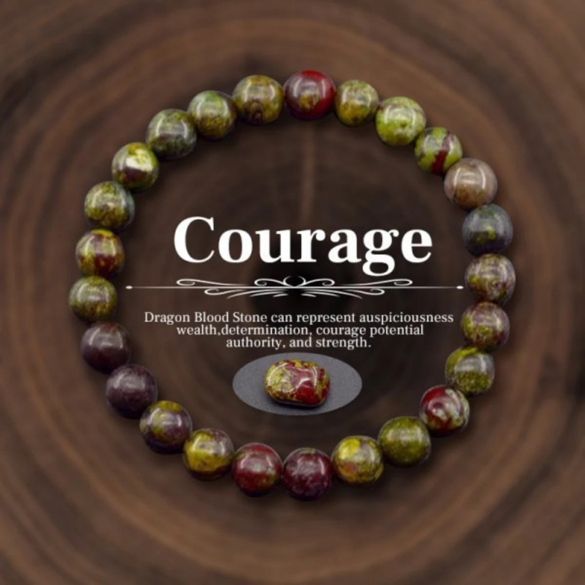 Dragon Blood Stone bracelet with 'Courage' text on a wooden background