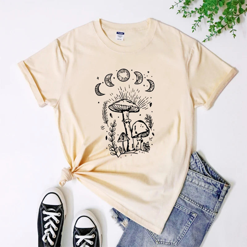 Beige t-shirt with mushroom design, black sneakers, and blue jeans on a white background