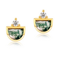 Gold earrings with green stone and clear gem on a white background