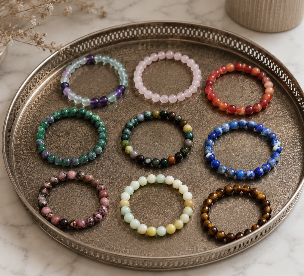 Set of colorful beaded bracelets on a decorative tray